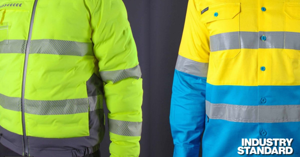 Worker wearing AS/NZS 4602.1 compliant hi-vis workwear on an Australian construction site